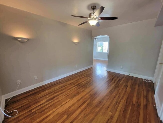 Living room empty view towards dining room - 100 Newburn Dr