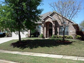 Building Photo - 6525 Tearose Dr