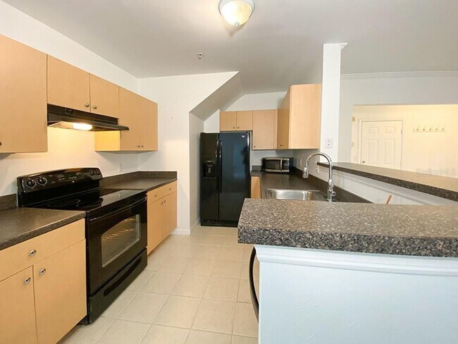 Foto del edificio - 4 Bedroom Townhome with Attached 2 Car Gar...