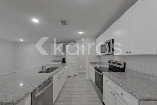 Building Photo - 4648 Malay Cir