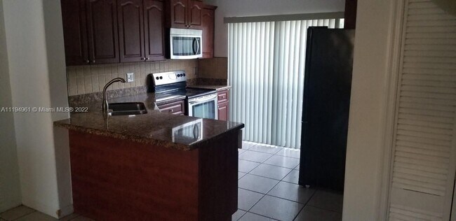 Building Photo - 5655 NW 109th Ave