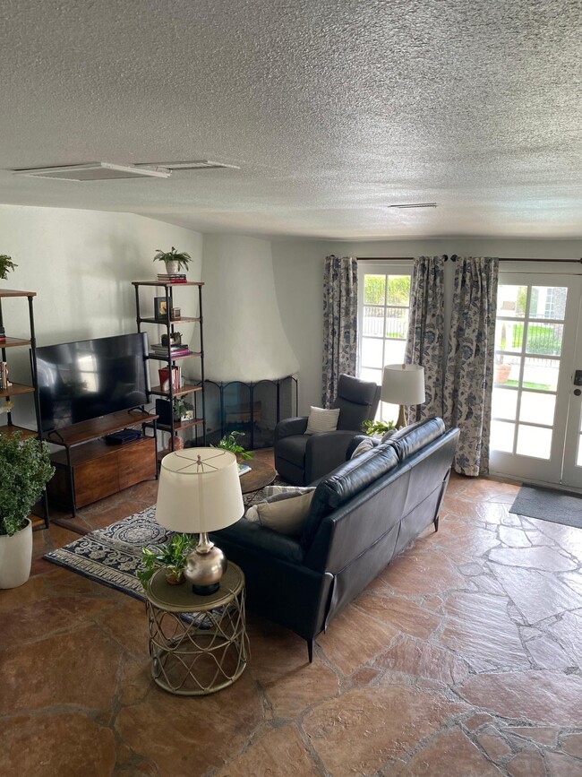 Comfortable living room with TV. - 5710 E Camelback Rd