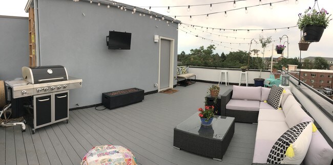 Patio: Grill, TV, Firepit, Furniture - 4960 Lowell Blvd