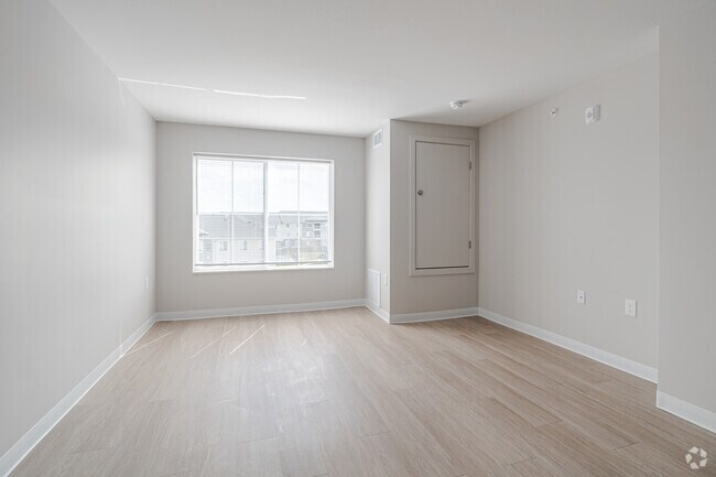 2 habitaciones, 1 baño - 841 pies cuadrados - Sala de estar - HoM Flats at Maynard