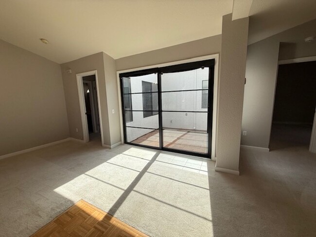 Building Photo - 2-Bedroom Corner Condo In Willowbrook Seni...