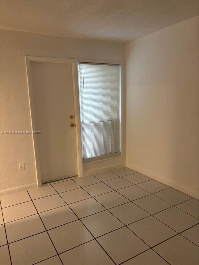 Building Photo - 1255 W 49th Pl
