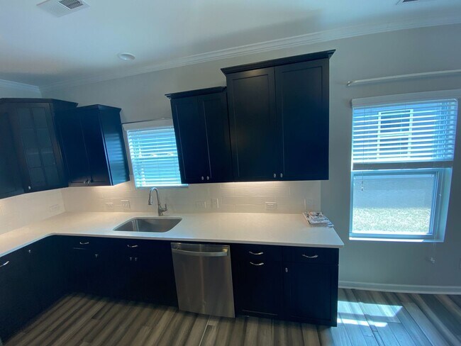 Building Photo - Move-in ready, 1.5 story home located in t...