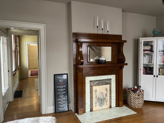 Original fireplace living room , looking into the dining room - 215 Thurman Ave