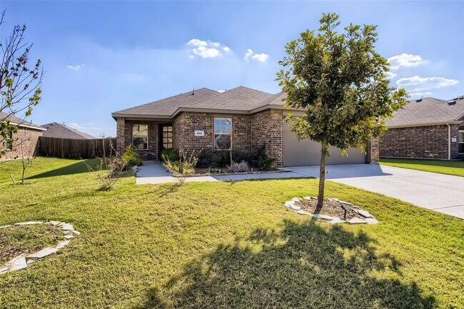Building Photo - This well-maintained 4 bedroom home is located in a quiet neighborhood that has a community park ...