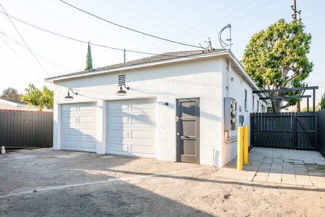 one small garage space one off street parking spot behind gate - 11112 Exposition Blvd