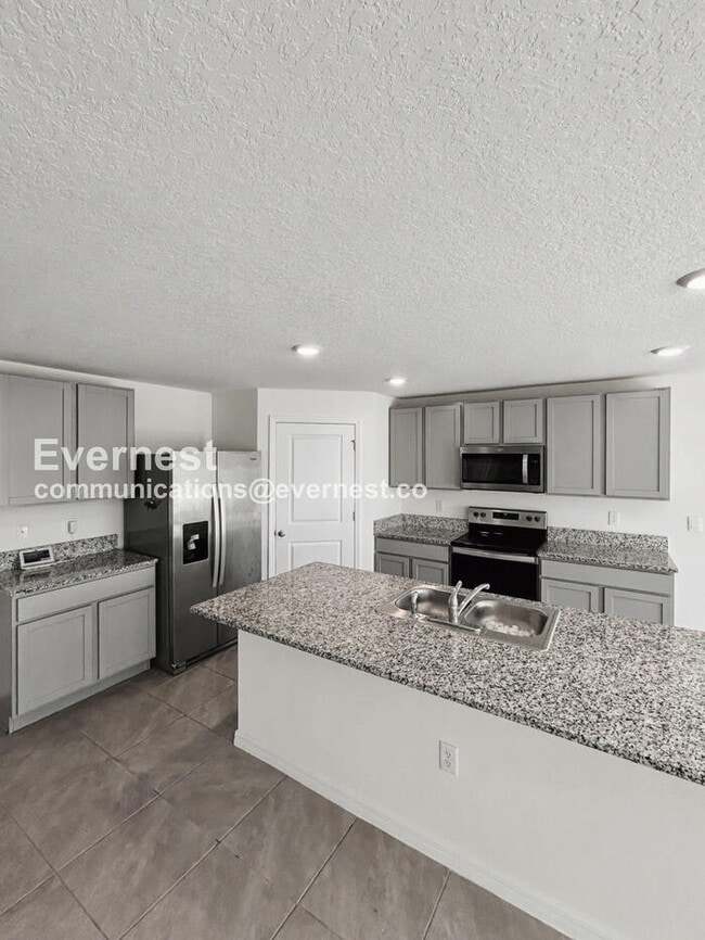 Building Photo - 5106 Plumeria Dr