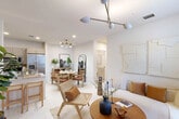 Located at 624 NE Second St in Dania Beach, FL, this well-appointed 2-bedroom, 2-bathroom single-floor residence offers a thoughtfully designed layout with a clean, contemporary aesthetic throughout. The open-concept living, dining, and kitchen area forms the heart of the home, bathed in natural light from large windows with sheer drapery. Light-toned tile flooring, crisp white walls, and modern statement light fixtures — including a sculptural multi-arm chandelier — lend the space a fresh, airy ambiance. The kitchen features stainless steel appliances and flows seamlessly into a dedicated dining area. The living room is anchored by a large front-facing window with outdoor views and direct access to the front entry. The spacious primary bedroom offers natural light, sliding glass doors opening to a private outdoor patio, and its own closet. The second bedroom is equally well-lit and comfortable. Both bathrooms are finished with granite countertops, undermount sinks, light wood cabinetry, and tub-shower combinations with clean tile surrounds. A hallway connects the bedrooms and bathrooms, with two closets providing practical storage. This residence combines functional design with modern style in a convenient South Florida location.