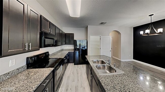 Building Photo - 3 br, 2.5 bath Townhome - 8980 Indigo Trai...