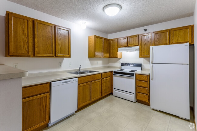 2BR, 1BA - 885SF - Kitchen - Meadow Creek Village