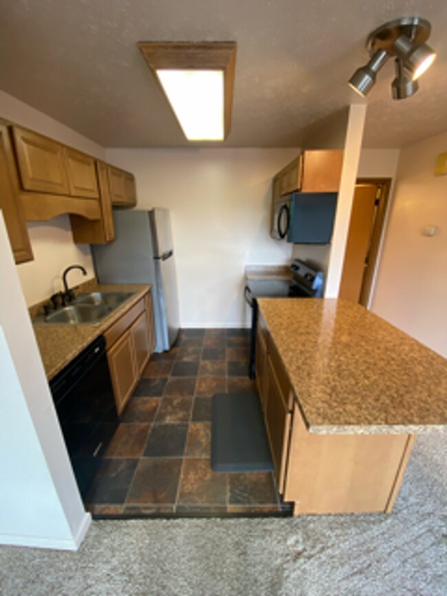 Building Photo - 2 Story Condo in West Fairbanks - Heat and...