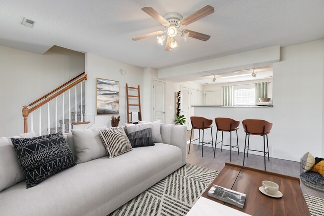 Living Room with Hardwood Style Flooring - Victoria Place Townhomes