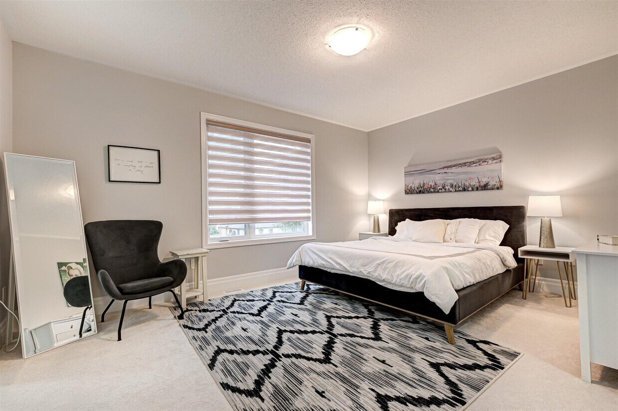 Introducing Bedroom C: Your Luxurious Primary Suite with King-Size Bed, Ensuite Movie-Star Bathroom - 34 Stanley Greene Blvd
