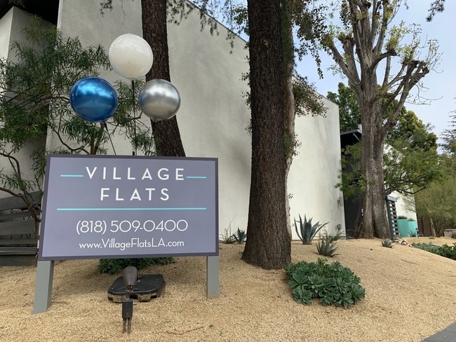 Building Photo - Village Flats: Mid-Century Design with Modern Convenience