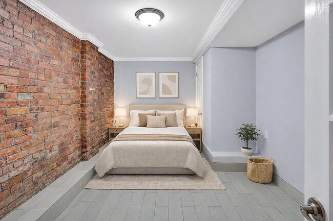Foto del edificio - 118 E 7th St