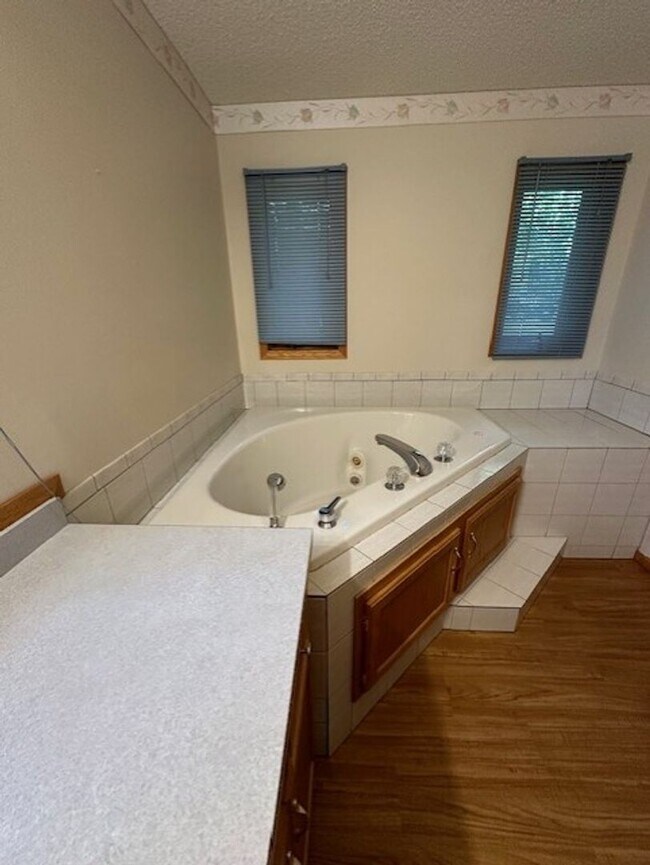 Building Photo - Lake Front 3 bedroom, 2.5 bath, 2 car atta...