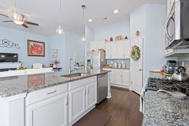 Building Photo - Available Now! Four bedroom, two bath home is Tuscany. Pet friendly!