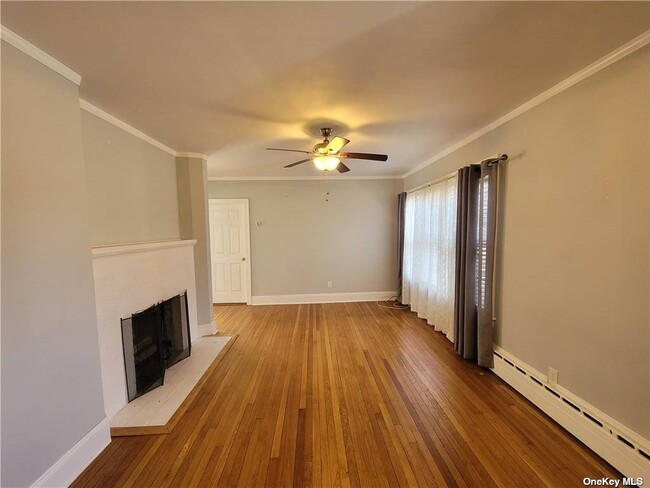 Living Room w/Fireplace - 10 Oakwood Rd