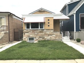 Building Photo - 7646 W 63rd Pl