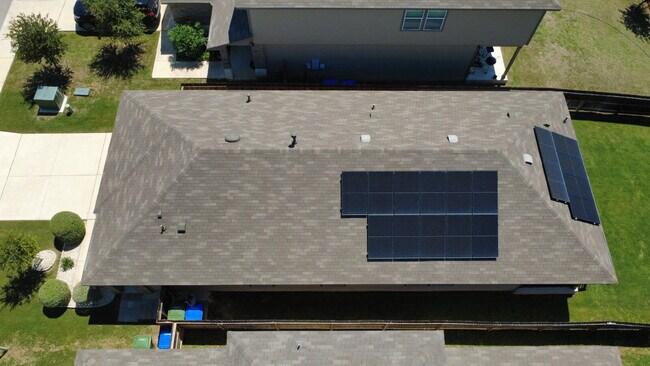 Building Photo - MOVE-IN READY | SOLAR PANELS | GREENBELT | COMMUNITY POOL & SPLASH PAD