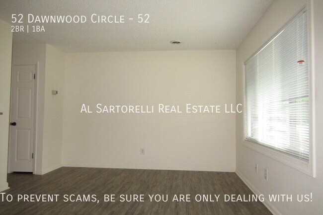 Building Photo - Pet Friendly Condo close to town and ready...