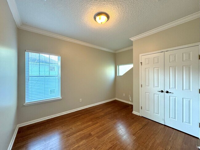 Building Photo - Coastal Charm: Luxurious 4-Bedroom Home in...