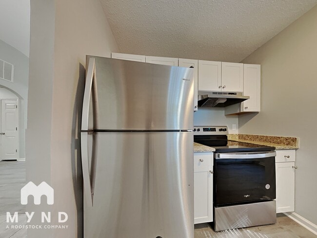 Building Photo - 5714 Justins Forest Dr