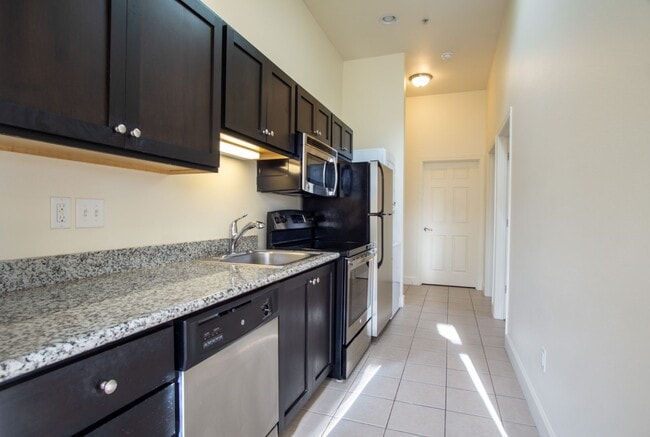 Building Photo - Corner 2 Bedroom with DW, W/D, Fireplace + Juliette Balcony!