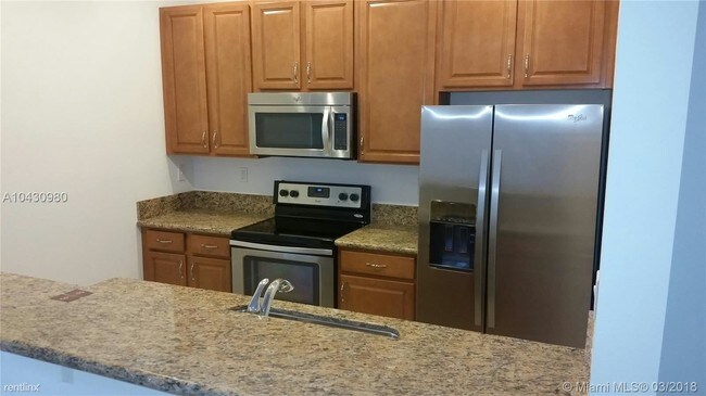Building Photo - 3 br, 3 bath Townhome - 14615 SW 14th St