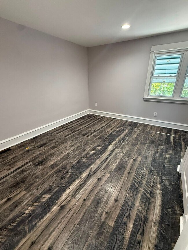 Building Photo - Spacious 2BR Home with Finished Basement  Central Air  $1,600/month