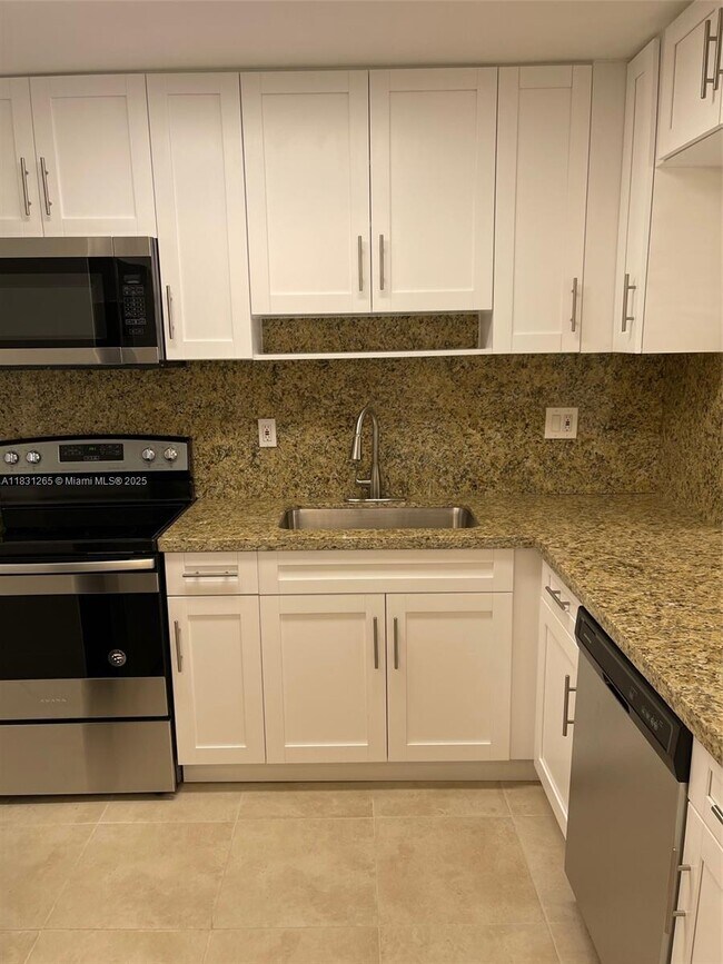 Foto del edificio - 6090 W 18th Ave