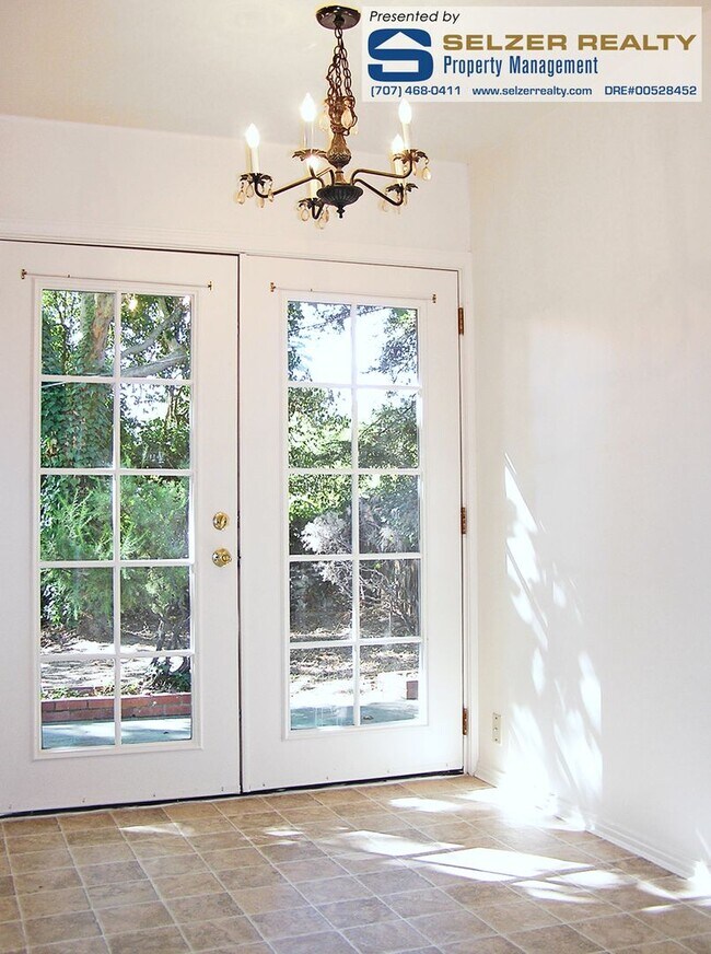 Building Photo - Charming 2 bd. home w/ big yard on the cus...