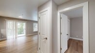 This contemporary 1-bedroom apartment in the Highlands of Marin offers 540 square feet of efficiently designed living space. The open-concept layout seamlessly integrates the living room, dining area, and kitchen, creating a spacious feel. The living area is bright and airy, with large windows and a sliding glass door that likely leads to a private outdoor space.

The kitchen is a standout feature, boasting modern wood cabinetry, stainless steel appliances, and sleek white countertops. It's equipped with ample storage and counter space, ideal for culinary enthusiasts.

The bedroom, measuring 140 square feet, is generously sized and features a large window for natural light. The bathroom is well-appointed with a modern vanity, white fixtures, and a combination tub-shower.

Throughout the apartment, light-toned wood flooring adds warmth and continuity. The neutral wall color enhances the sense of space and light. Built-in storage solutions, including a closet with sliding doors, maximize the use of space.

This apartment combines contemporary design with practical living, making it an attractive option for those seeking a modern, low-maintenance lifestyle in San Rafael.