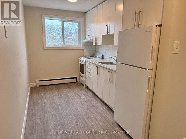 Building Photo - 1500 Mclarenwood Terrace