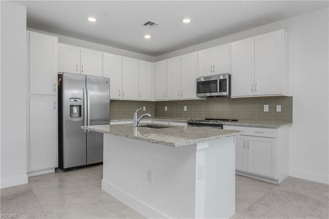 Building Photo - 26410 Coco Cay Cir