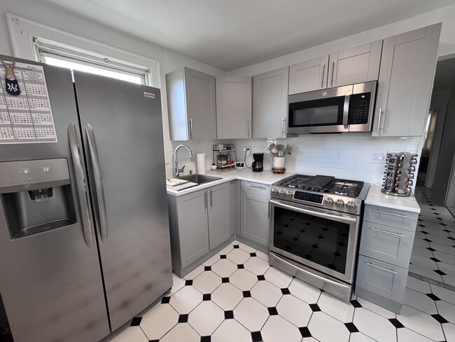 New Kitchen Cabinets - 136 Rothwell Ave