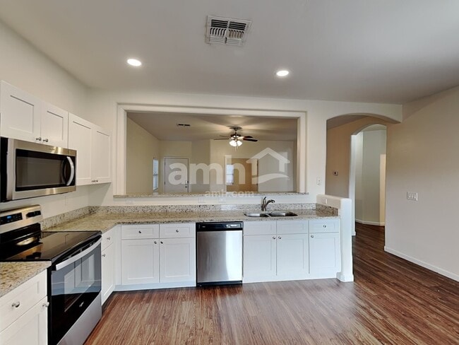 Building Photo - 15355 W Port Au Prince Ln