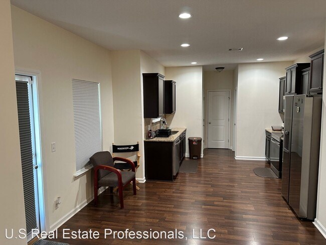 Foto del edificio - 4 br, 2.5 bath House - 125 WW Winn Ave
