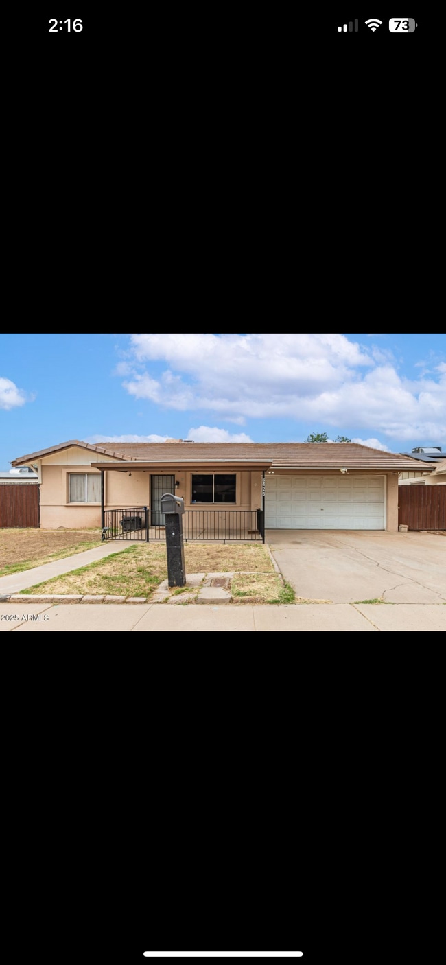 Building Photo - 6426 W Lamar Rd