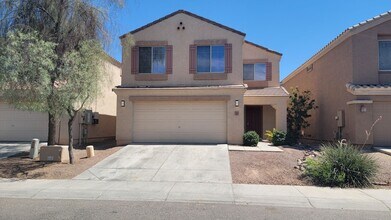 Building Photo - 12933 W Fleetwood Ln