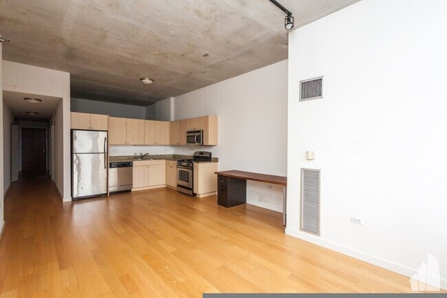 Foto del edificio - Beautiful 1 Bedroom Condo in The Loop!