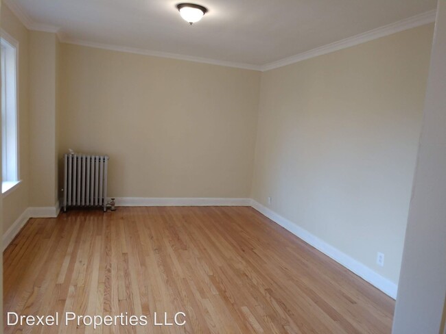 Building Photo - 6334 N Artesian Ave