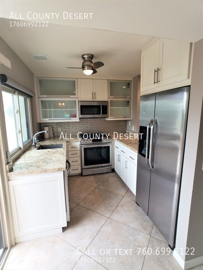 Building Photo - 48822 Desert Flower Dr