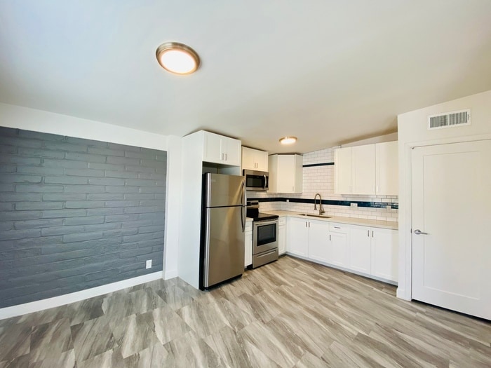 Primary Photo - 1/2 OFF Move In Special! Modern living in this completely remodeled 3 Bed/2Bath - Community Pool ...