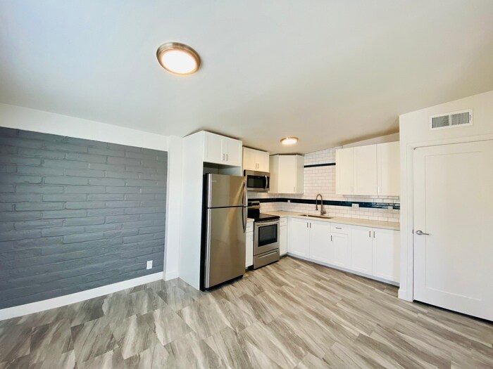 Primary Photo - Modern living in this completely remodeled...