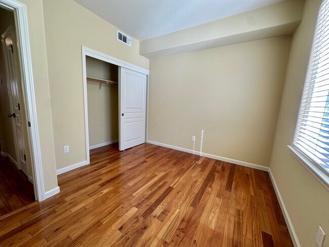 Building Photo - TOWNHOME WITH THOUGHTFUL UPGRADES | CALM SETTING